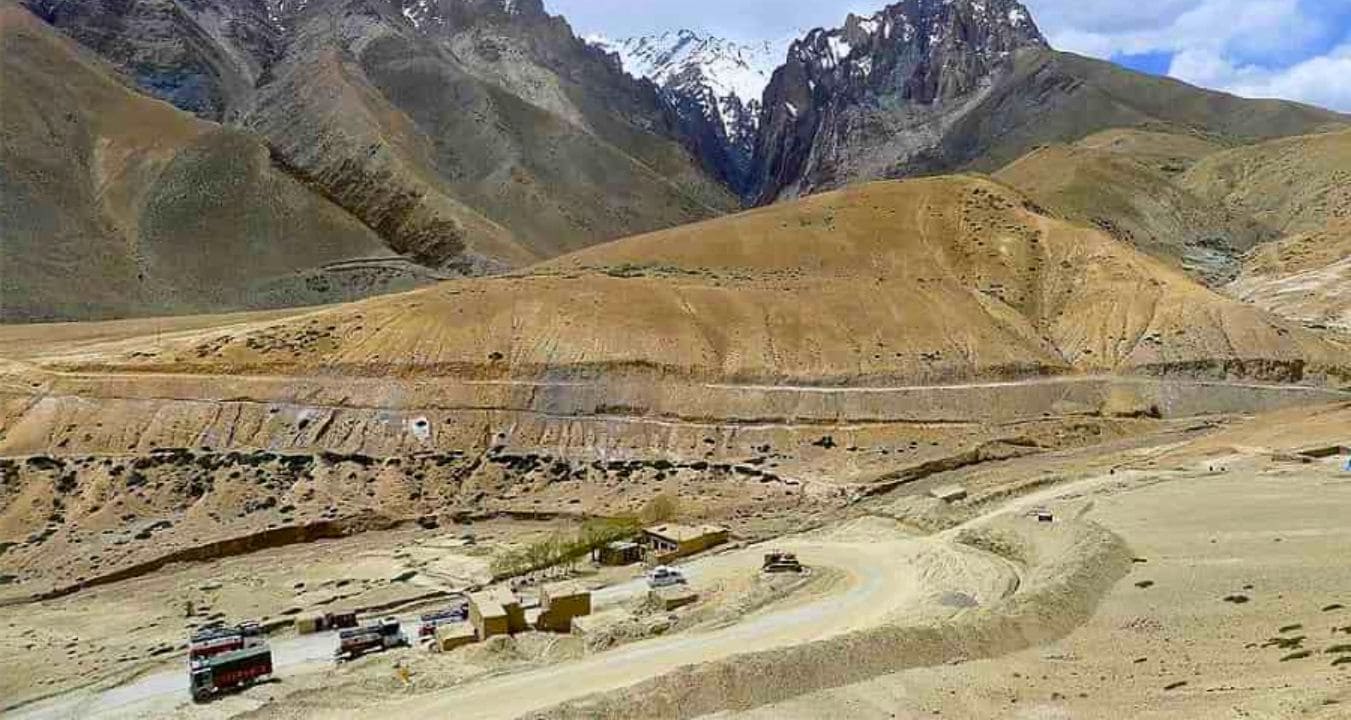 Bikers riding through Fotu La Pass high-altitude road in Ladakh