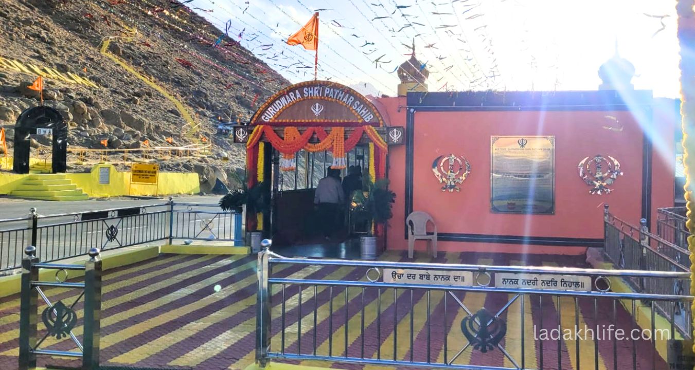 Gurudwara Pathar Sahib Ladakh surrounded by scenic mountains and serene landscape