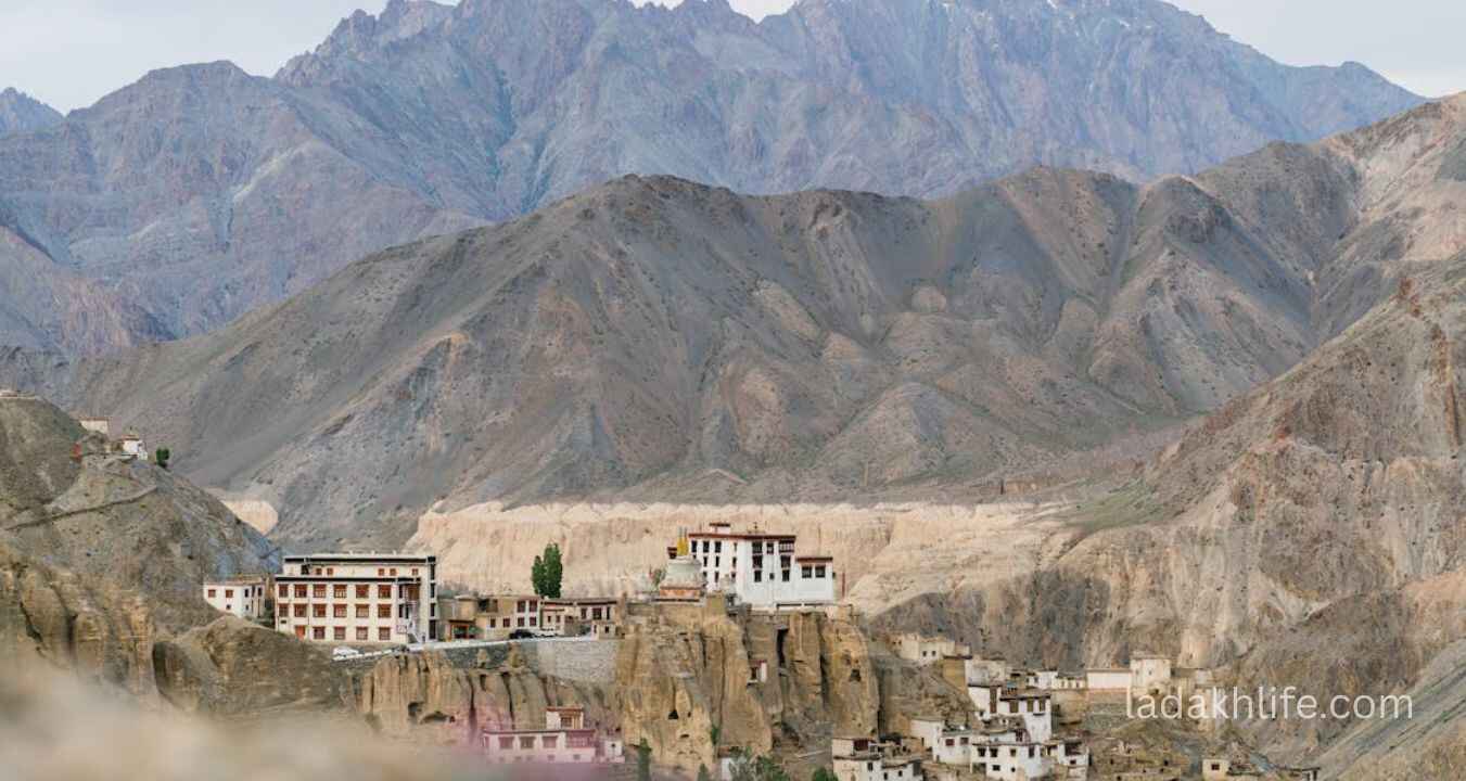 Monks praying inside Phugtal Gompa Buddhist monastery Ladakh