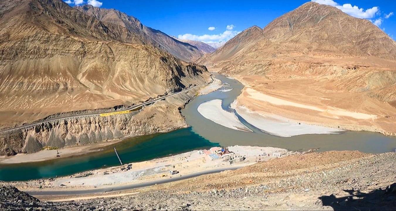 Close view of Indus and Zanskar rivers meeting at Sangam Point Ladakh with contrasting water colors