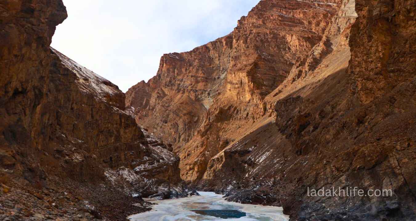 Indus River flowing through wide Himalayan valley in Ladakh surrounded by barren mountains
